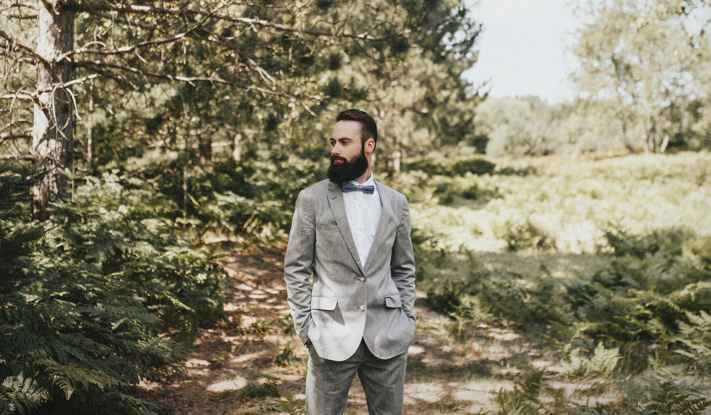 Makyle Welke standing in a Northern Michigan woodland